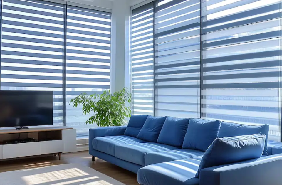 Modern living room with zebra blinds offering light control and privacy, showcasing stylish window treatments by Blinds in a sleek, contemporary interior.